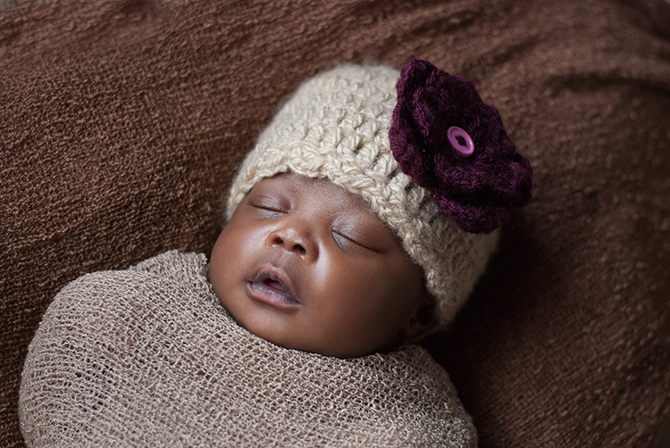 newborn photographer in White Bear Lake, MN capturing quiet, connected moments with new parents.