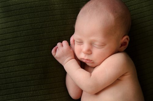 newborn during a relaxed studio portrait session, Twin Cities newborn photographer.